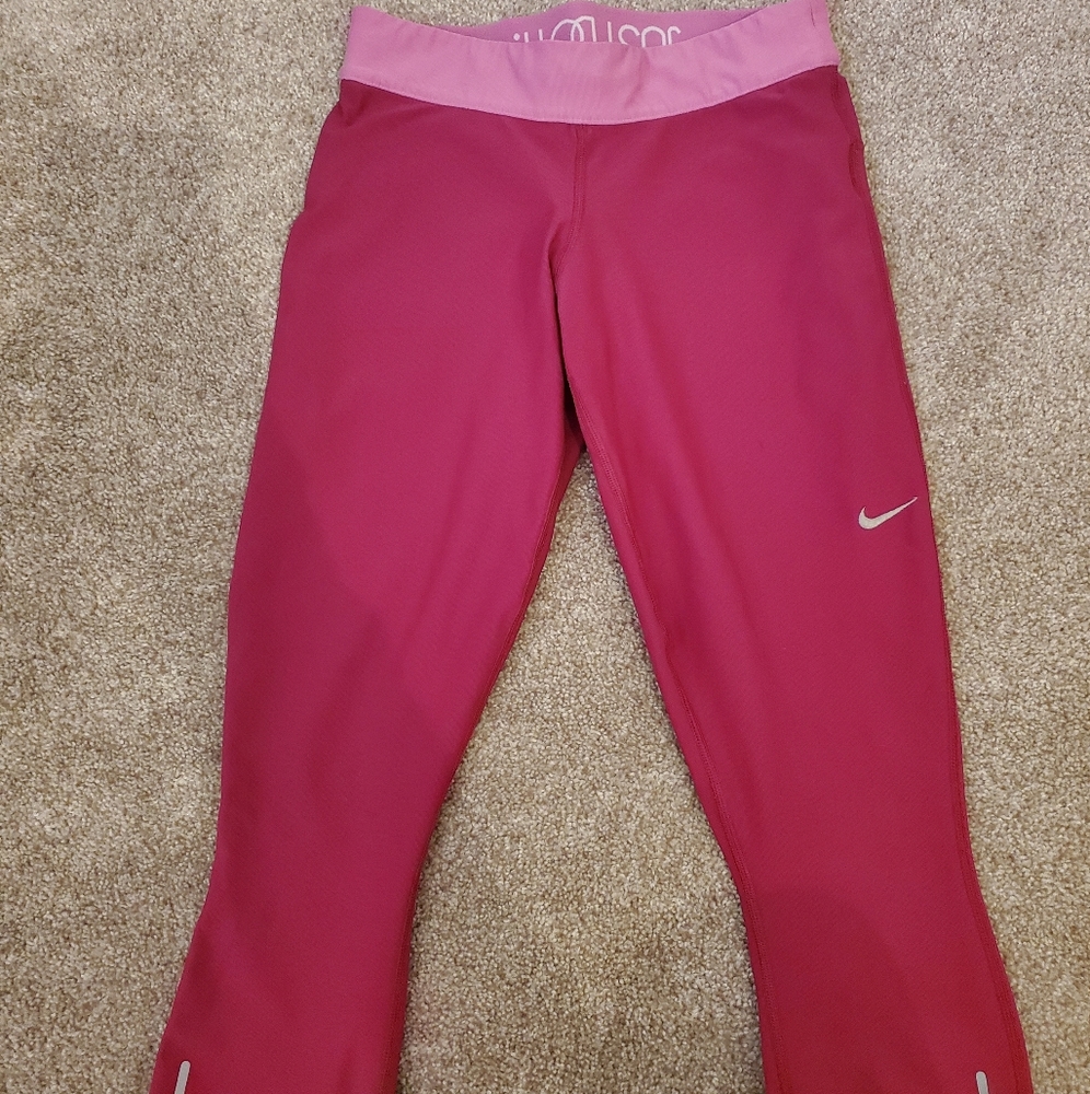 Hot pink Nike capris
